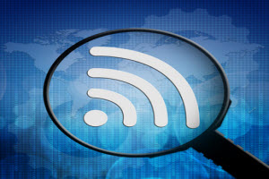 Icon of WIFI symbol under a Magnifying Glass
