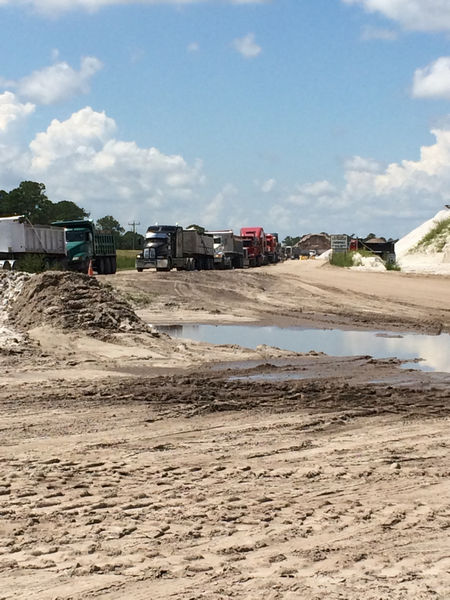 Trucks lined up for weighing prior to leaving Immokalee Sand Mine