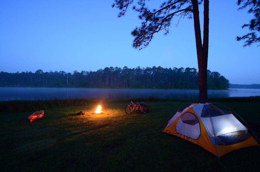 Blackwater Bike Camp photo of a campfire by the river by Stefis Demetropoulos-Florida Forrest Service
