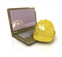 Laptop and Hard Hat - Technical Engineer Concept