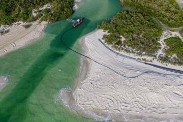Closeup view ofg A dredging project removes sand from Clam Pass 