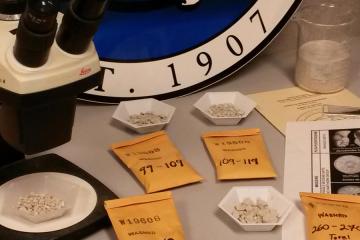 Close-up of geology samples and lab equipment