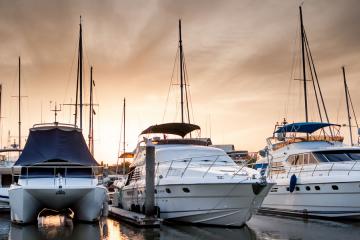 Yacht and boats at the marina in the evening