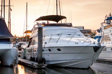Yacht and boats at the marina in the evening