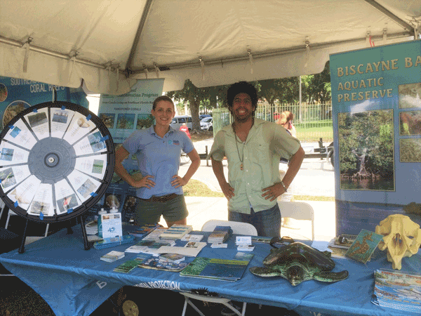 Staff teaching the public about Biscayne Bay Aquatic Preserves at an outreach event